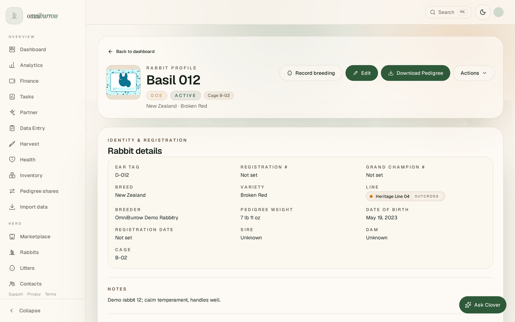 A web rabbit profile for Basil 012, showing the doe and active status badges above ear tag, breed, variety, breeder, pedigree weight, registration and date-of-birth fields